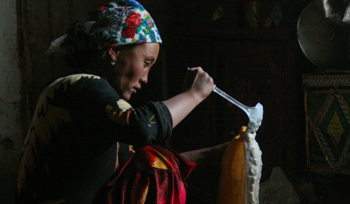 Cara Kerven, In Murghab town, the largest settlement in the eponymously named
district in Gorno-Badakhshan Autonomous Region, Tajikistan. Many
families lease their livestock to hired shepherds. Here, the wife of a shepherd pours yogurt (ayran) made from yak’s milk to take with us back into Murghab town