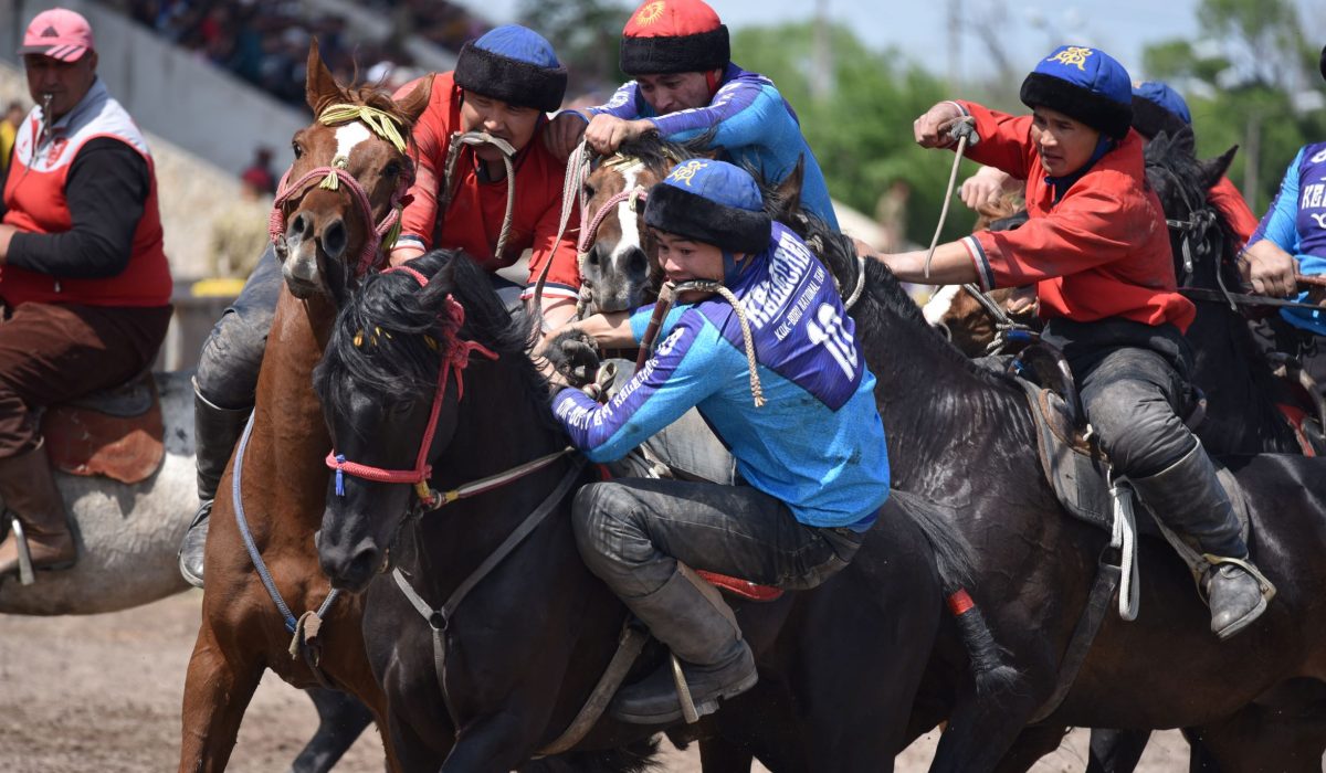 Moira O’Shea, Kyrgyzstan, 2018, Kelechek, the name of the team in blue, means ‘the future’ in Kyrgyz.
Winning the Mayor’s Cup during this game certainly meant big
things for the team as they were able to compete in the Victory Day
celebrations and have a chance to move from the semi-professional to
professional league. While Kok-boru is a game with an ancient history,
it is simultaneously being popularized and formalized in Kyrgyzstan
with the creation of two leagues, and much attention being payed to
international standards for the game. Bishkek, Kyrgyzstan, 2019.